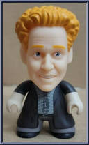 Janosz (Blue Suit) Action Figure