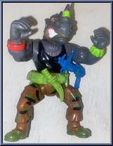 Machine Gunnin' Rocksteady from Teenage Mutant Ninja Turtles - Wacky Action manufactured by Playmates [Loose]