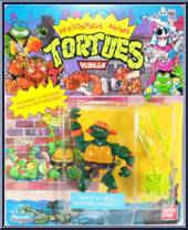 Rock 'N Roll Michaelangelo from Teenage Mutant Ninja Turtles - Wacky Action manufactured by Playmates [Front]